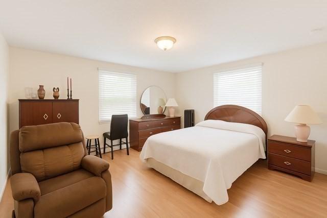 3 Walker Rd Unit 9, North Andover, MA 01845 - bedroom featuring light wood-style floors and baseboards