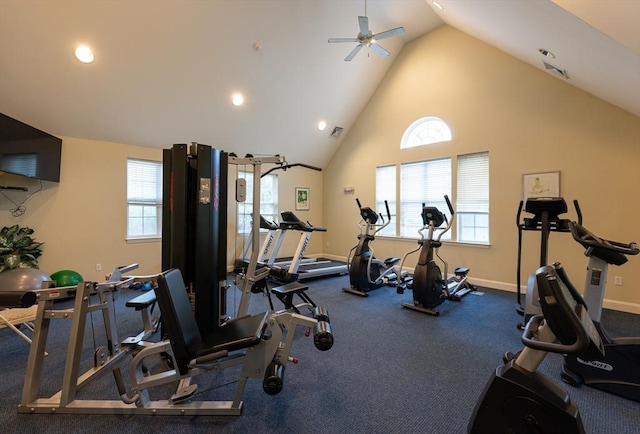 exercise room with a ceiling fan, recessed lighting, baseboards, and high vaulted ceiling