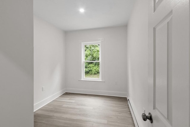 551 Chestnut St, Athol, MA 01331 - spare room with baseboard heating, wood finished floors, and recessed lighting