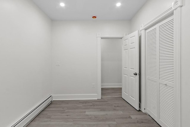 551 Chestnut St, Athol, MA 01331 - hallway featuring baseboard heating, recessed lighting, and wood finished floors
