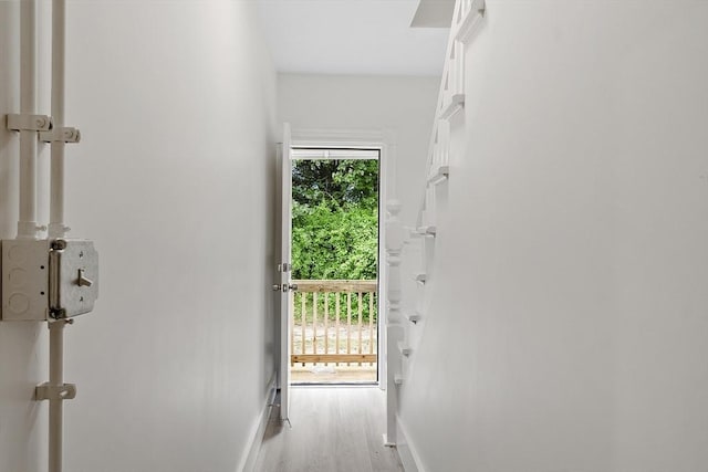 551 Chestnut St, Athol, MA 01331 - doorway to outside featuring baseboards and light wood finished floors