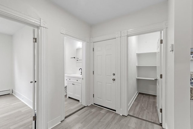 551 Chestnut St, Athol, MA 01331 - closet featuring a sink and baseboard heating
