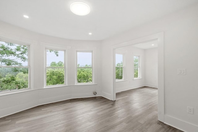 551 Chestnut St, Athol, MA 01331 - empty room with wood finished floors and recessed lighting