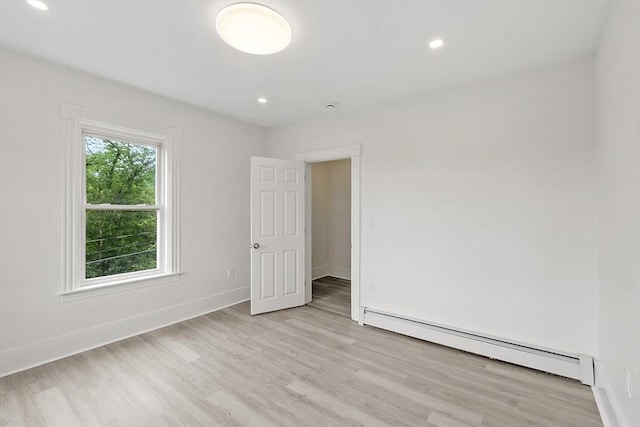 551 Chestnut St, Athol, MA 01331 - spare room with a baseboard radiator, light wood-style flooring, and recessed lighting