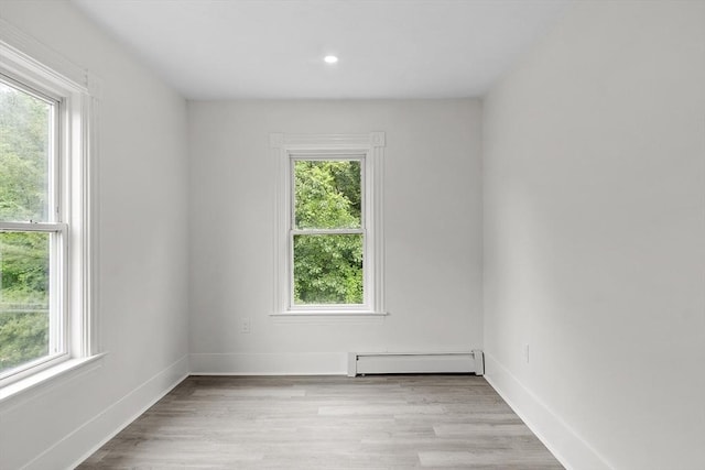 551 Chestnut St, Athol, MA 01331 - empty room with baseboard heating, wood finished floors, and recessed lighting