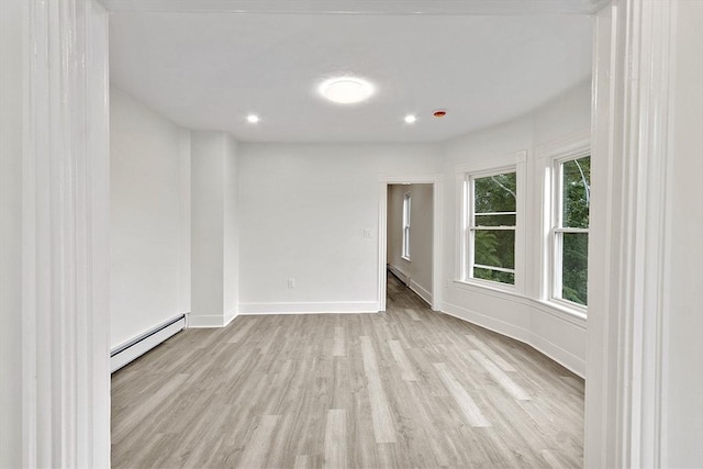 551 Chestnut St, Athol, MA 01331 - unfurnished room featuring baseboard heating, wood finished floors, a baseboard radiator, and recessed lighting