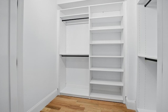 61 Lyndhurst St Unit A, Boston, MA 02124 - walk in closet with wood finished floors