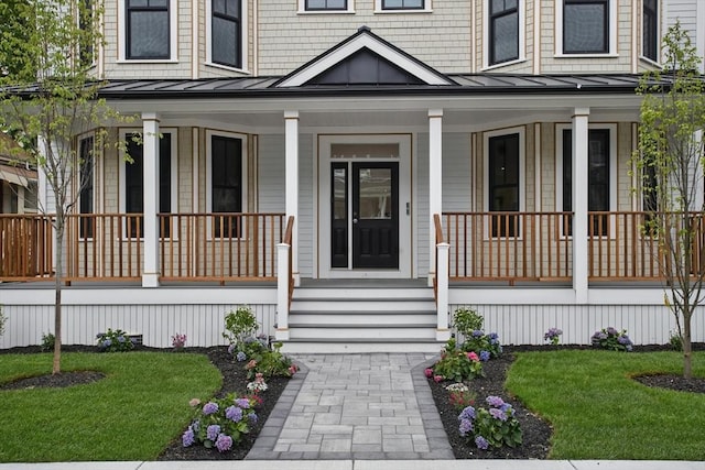 61 Lyndhurst St Unit A, Boston, MA 02124 - property entrance featuring a standing seam roof, covered porch, metal roof, and a yard