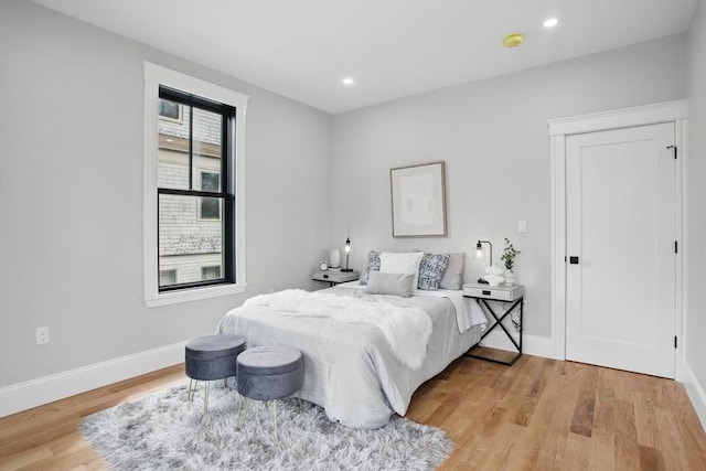 61 Lyndhurst St Unit A, Boston, MA 02124 - bedroom featuring light wood-type flooring, baseboards, and recessed lighting