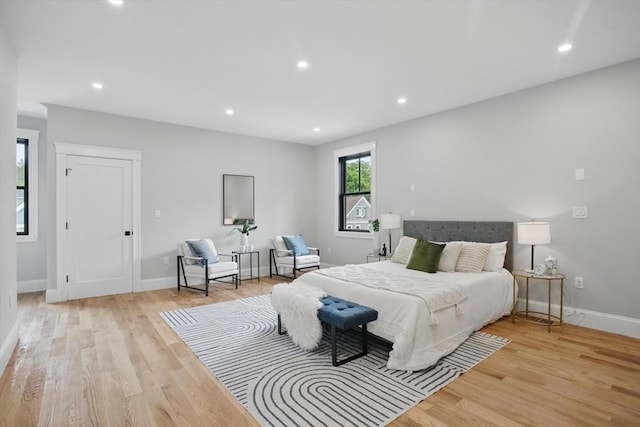 61 Lyndhurst St Unit A, Boston, MA 02124 - bedroom featuring light wood-style flooring, baseboards, and recessed lighting