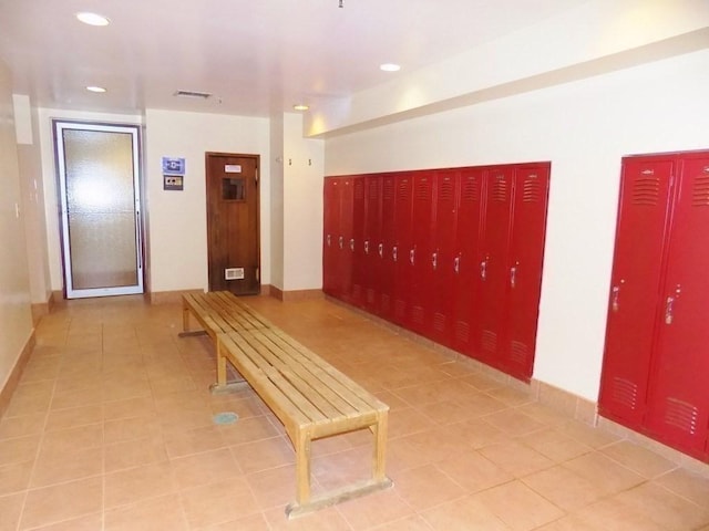 hallway featuring tile patterned floors