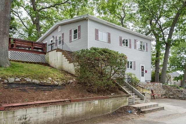 38 Colonial Rd, Weymouth, MA 02191 - view of front of property with a deck and stairway