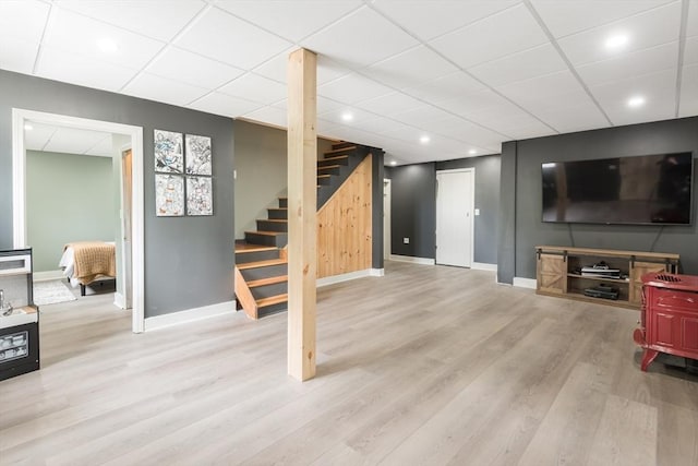 38 Colonial Rd, Weymouth, MA 02191 - living room featuring baseboards, light wood finished floors, stairs, a drop ceiling, and recessed lighting
