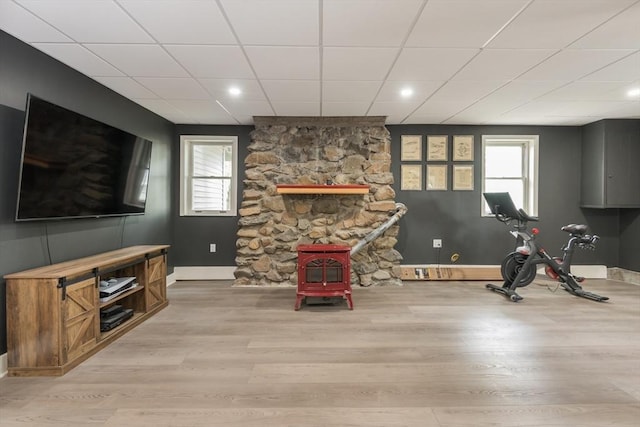 38 Colonial Rd, Weymouth, MA 02191 - workout room featuring a wood stove, baseboards, a paneled ceiling, wood finished floors, and recessed lighting