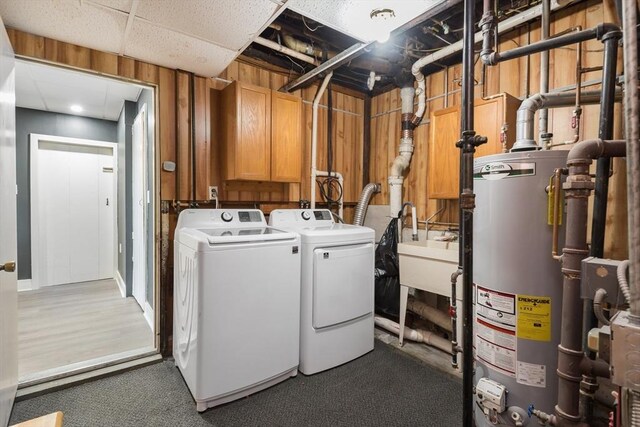 38 Colonial Rd, Weymouth, MA 02191 - washroom featuring water heater, washer and dryer, and carpet