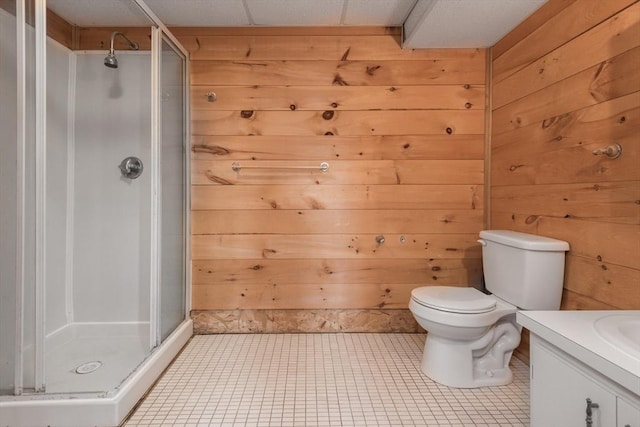38 Colonial Rd, Weymouth, MA 02191 - full bath with vanity, a shower stall, toilet, tile patterned flooring, and wood walls
