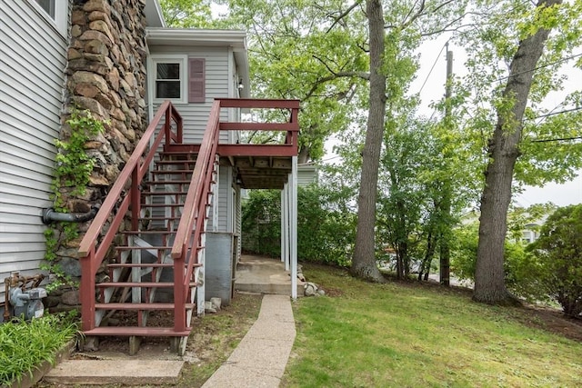38 Colonial Rd, Weymouth, MA 02191 - view of grassy yard with stairs and a wooden deck