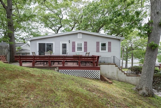 38 Colonial Rd, Weymouth, MA 02191 - back of property with a deck