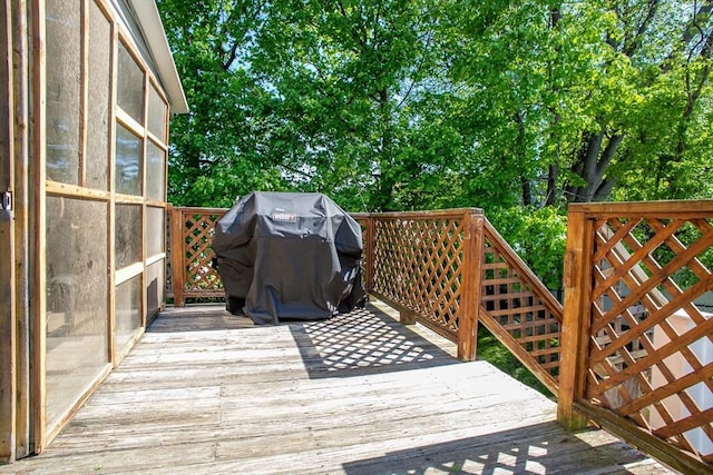 wooden terrace with grilling area