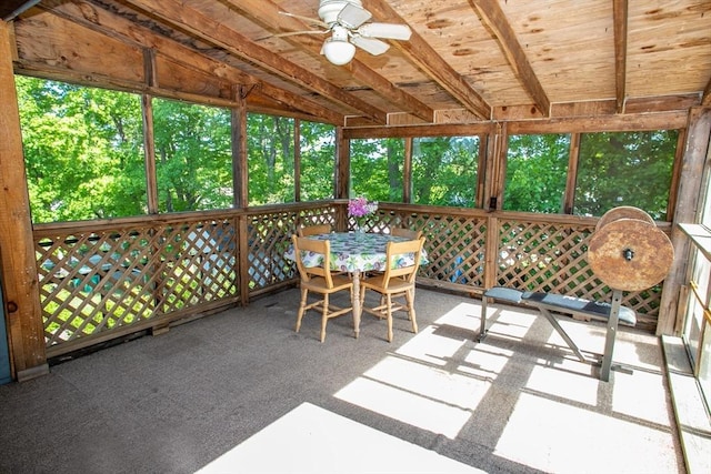 sunroom with ceiling fan and outdoor dining space