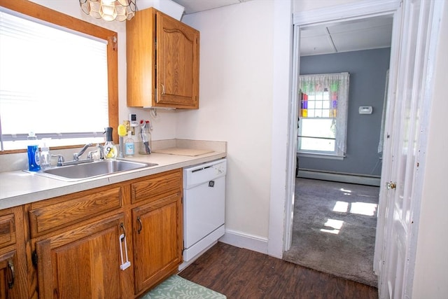 kitchen with white dishwasher, a baseboard radiator, a sink, dark wood-style floors, and brown cabinetry