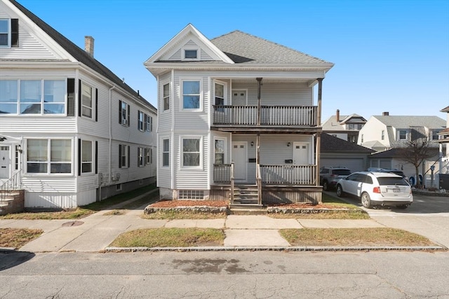 view of front of home with a balcony