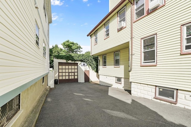 view of property exterior with cooling unit