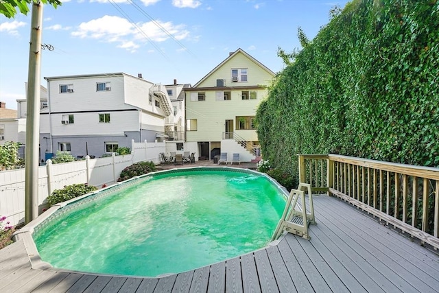 view of pool featuring a deck