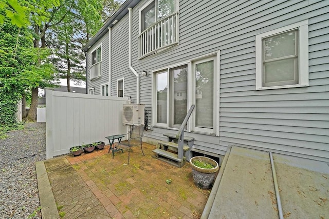 141 Pleasant St Unit 7, Attleboro, MA 02703 - view of patio with entry steps and a cooling unit