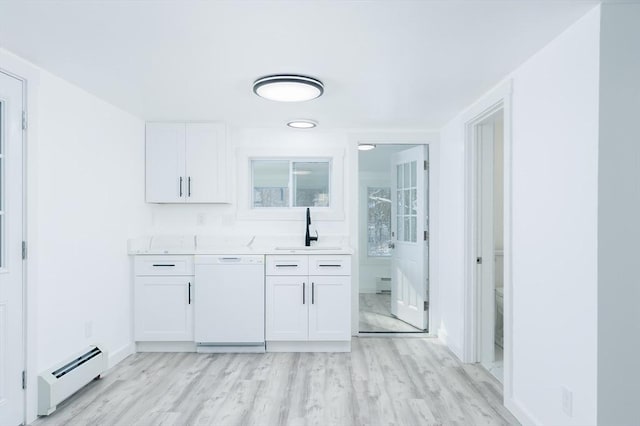 bar with sink, a baseboard radiator, white cabinetry, and dishwasher