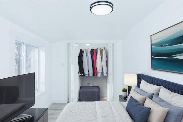 bedroom with light hardwood / wood-style flooring