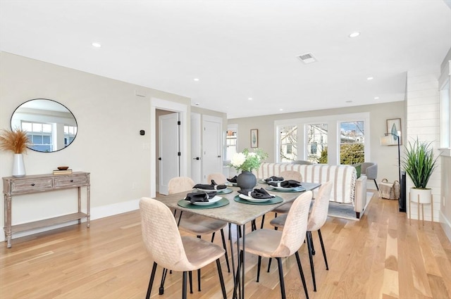 dining room featuring light hardwood / wood-style floors