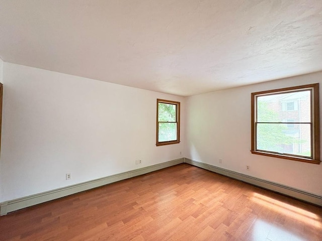 2 Robert Cohen Dr, Canton, MA 02021 - empty room featuring light wood-style flooring and baseboards