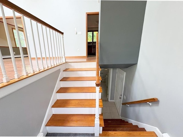 2 Robert Cohen Dr, Canton, MA 02021 - staircase featuring a baseboard radiator and baseboards