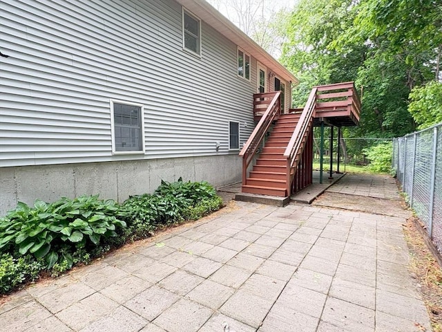 2 Robert Cohen Dr, Canton, MA 02021 - fenced backyard with a patio area, stairs, and a deck