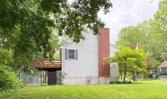 2 Robert Cohen Dr, Canton, MA 02021 - view of side of property with a chimney and a deck