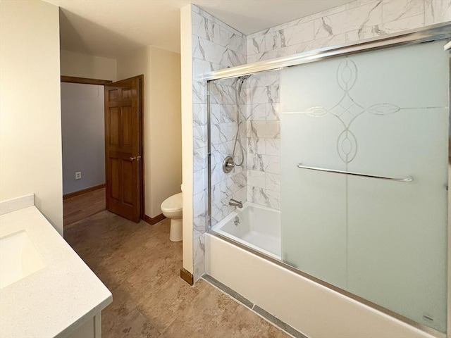 2 Robert Cohen Dr, Canton, MA 02021 - full bathroom featuring vanity, toilet, bath / shower combo with glass door, and baseboards