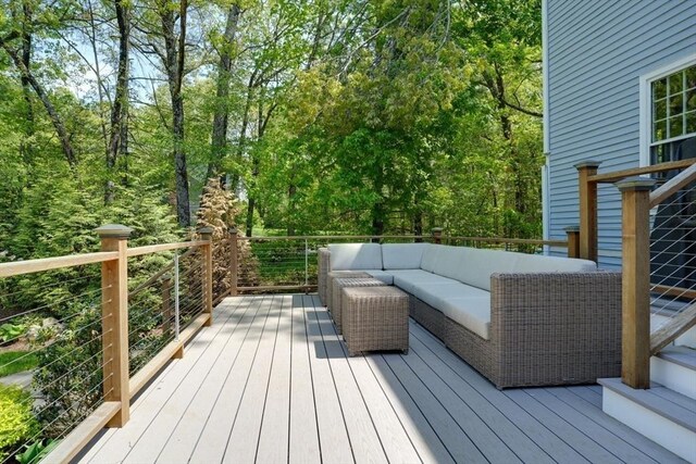 deck featuring outdoor lounge area