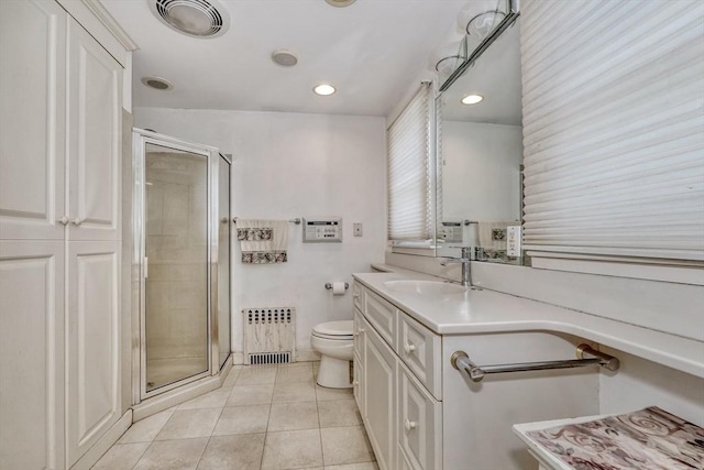 68-70 Floyd St, Winthrop, MA 02152 - bathroom with toilet, tile patterned flooring, radiator, and a stall shower