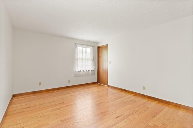 82 Neponset St Unit E, Canton, MA 02021 - spare room featuring light wood-style floors and baseboards
