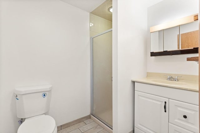 82 Neponset St Unit E, Canton, MA 02021 - bathroom featuring vanity, a shower stall, toilet, and baseboards