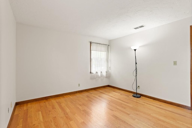 82 Neponset St Unit E, Canton, MA 02021 - empty room featuring light wood-style flooring and baseboards