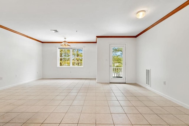 unfurnished room featuring baseboards, a notable chandelier, ornamental molding, and visible vents