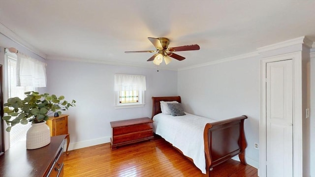 56-58 E Bacon St, Plainville, MA 02762 - bedroom featuring light wood finished floors, crown molding, baseboards, and a ceiling fan