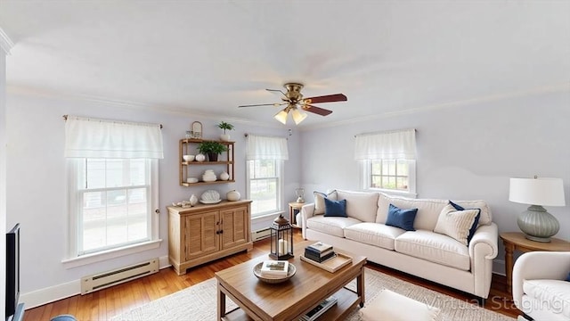 56-58 E Bacon St, Plainville, MA 02762 - living room with a baseboard heating unit, a ceiling fan, crown molding, light wood-style floors, and baseboards
