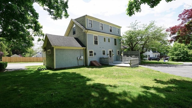 56-58 E Bacon St, Plainville, MA 02762 - rear view of property with a wooden deck