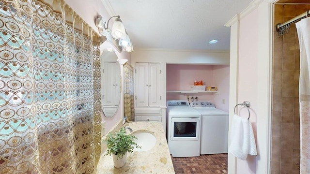 56-58 E Bacon St, Plainville, MA 02762 - laundry room featuring crown molding and independent washer and dryer