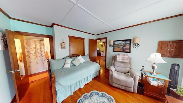 56-58 E Bacon St, Plainville, MA 02762 - bedroom with crown molding and wood finished floors