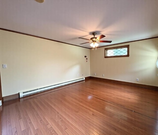 56-58 E Bacon St, Plainville, MA 02762 - spare room with a baseboard heating unit, ceiling fan, wood-type flooring, ornamental molding, and baseboards