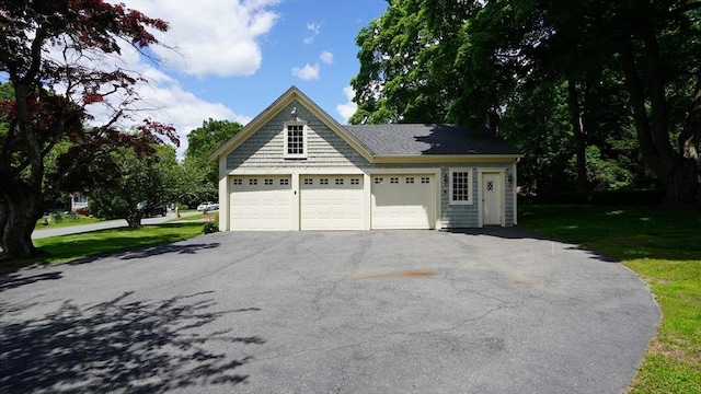 56-58 E Bacon St, Plainville, MA 02762 - view of side of home featuring a lawn and a garage